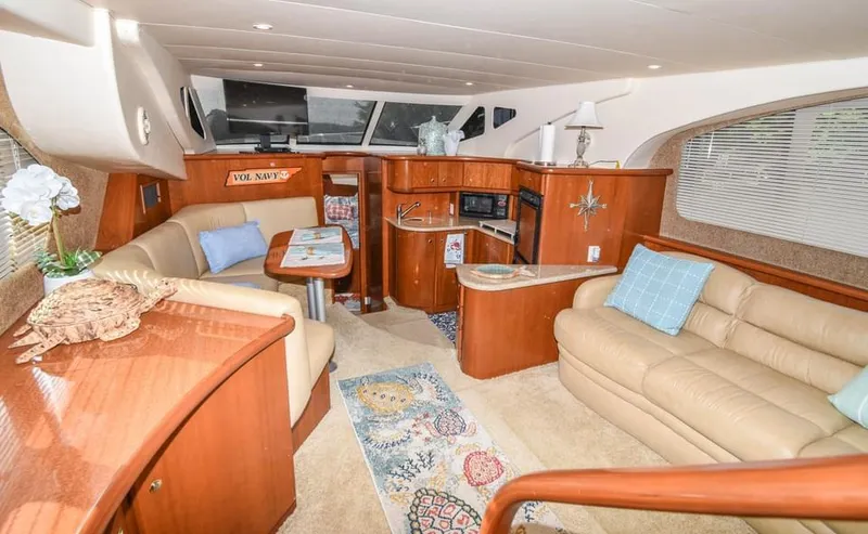 Slide: The Image of Luxurious 2007 Silverton 35 Motor Yacht interior with elegant seating and modern amenities. - 10