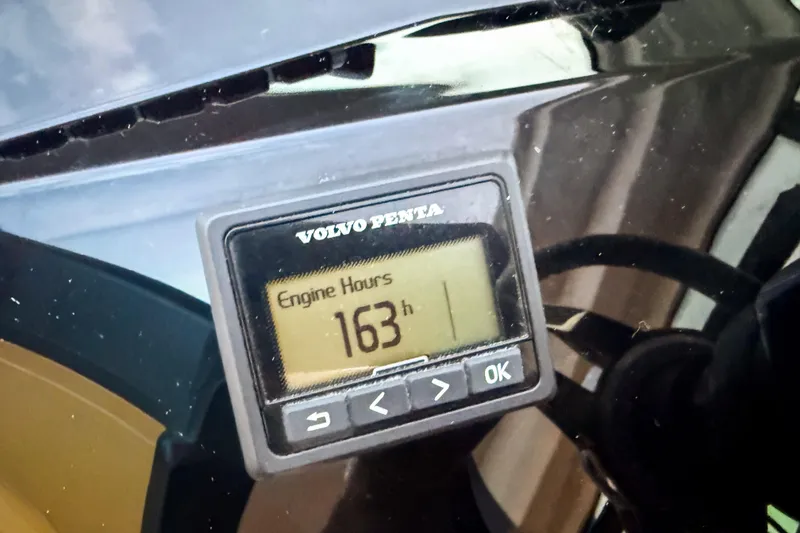 Slide: The Image of Volvo Penta engine hour meter displaying 163 hours on Beneteau Gran Turismo 45, 2023 model. - 21