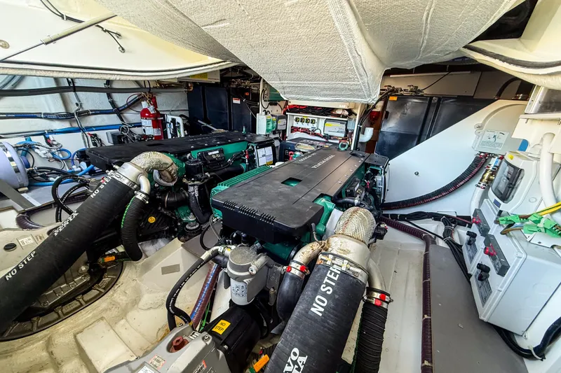 Slide: The Image of Engine room of 2023 Beneteau Gran Turismo 45 yacht, showcasing dual Volvo Penta engines. - 23