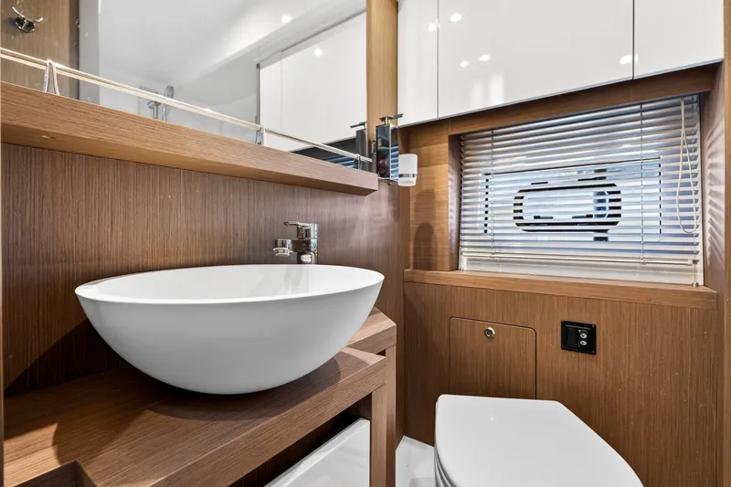 Slide: The Image of Luxurious bathroom interior of 2023 Beneteau Gran Turismo 45 yacht with modern fixtures. - 32