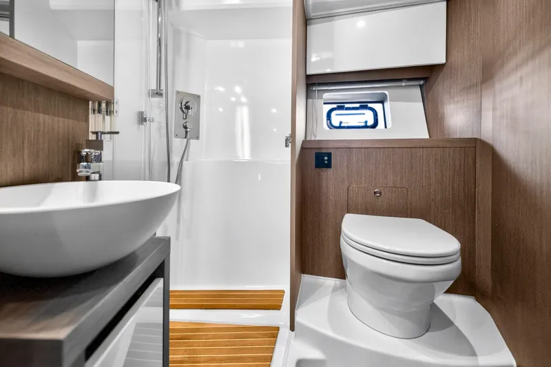 Slide: The Image of Luxurious bathroom in 2023 Beneteau Gran Turismo 45 yacht with modern fixtures. - 45