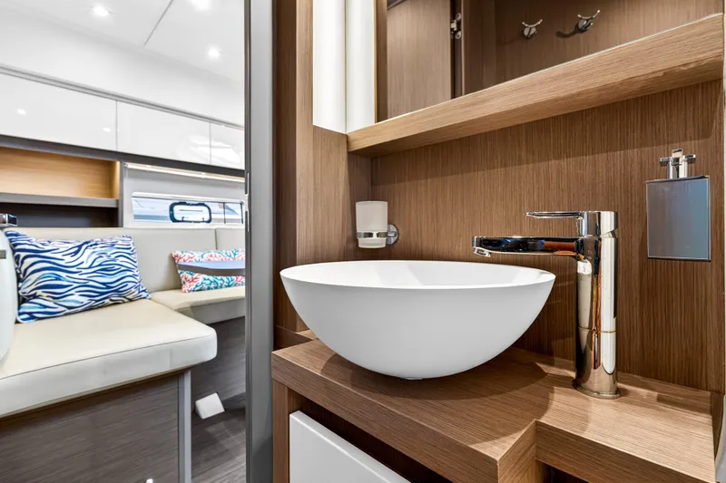 Slide: The Image of Luxurious bathroom interior of 2023 Beneteau Gran Turismo 45 yacht with modern sink and faucet. - 46