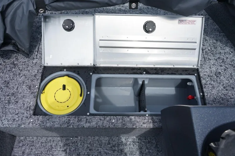 Slide: The Image of 2025 TRACKER BOATS Pro Guide V16 SC storage compartments with pump-out feature. - 11