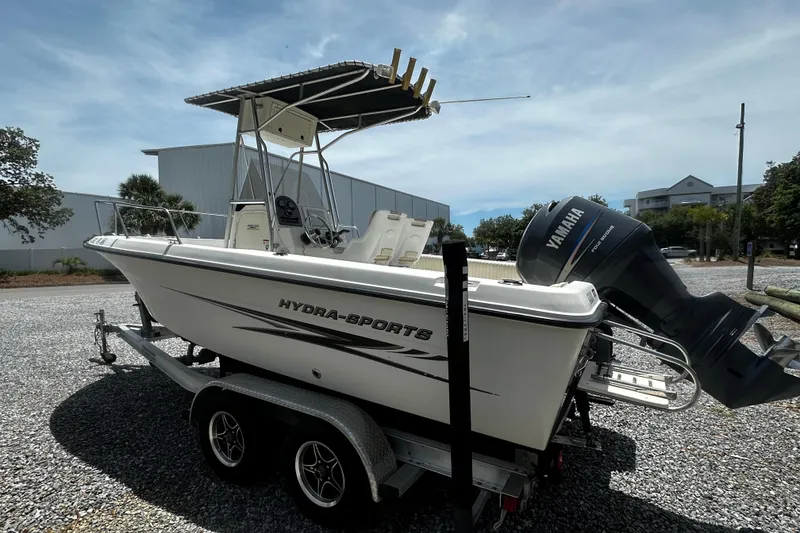 Slide: The Image of 2008 Hydra Sport 212 Lightning boat with Yamaha outboard motor on a trailer. - 3