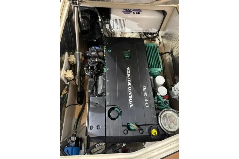 Slide: The Image of Engine compartment of 2025 Ranger Tugs R-31 CB with Volvo Penta D4-320 engine. - 24