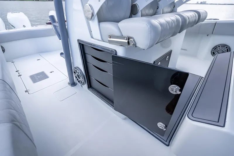 Slide: The Image of Interior of a 2020 Freeman 42LR boat with seating and storage compartments. - 12