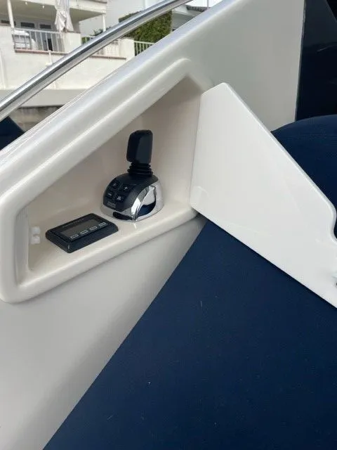 Slide: The Image of Control console of the 2017 Tiara Yachts C53 Coupe. - 47