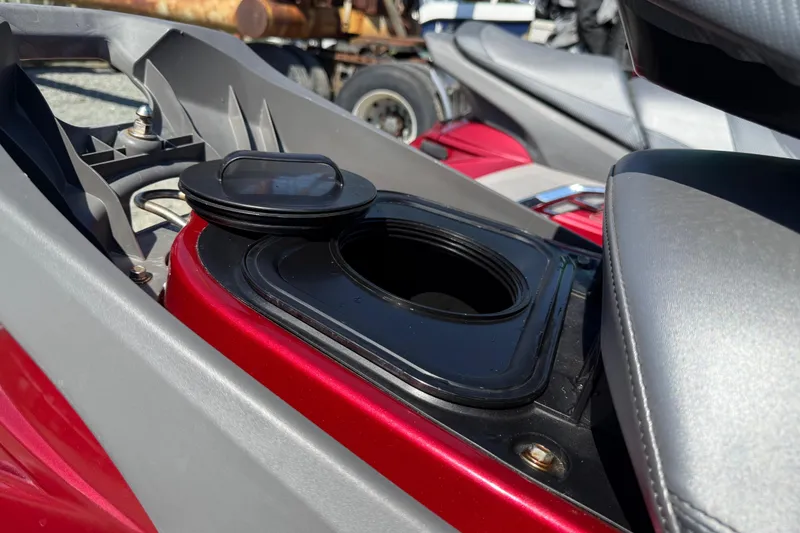 Slide: The Image of 2013 Yamaha WaveRunner FX HO storage compartment with open lid, showcasing interior details. - 10