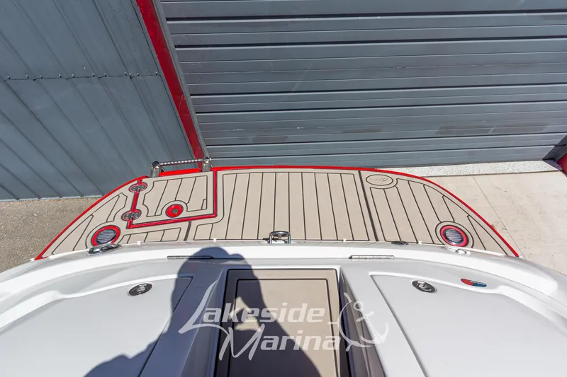 Slide: The Image of 2008 Crownline 240 LS boat deck with red trim at Lakeside Marina. - 11