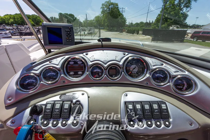 Slide: The Image of Dashboard of a 2008 Crownline 240 LS boat with gauges and controls. - 21