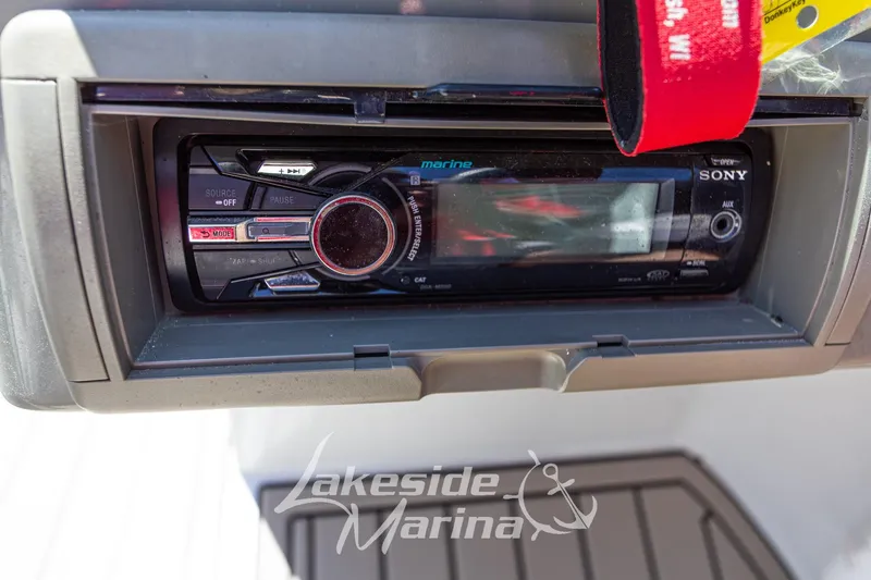 Slide: The Image of Sony marine stereo system in a 2008 Crownline 240 LS boat dashboard. - 23