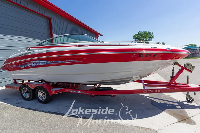Slide: The Image of 2008 Crownline 240 LS boat on red trailer at Lakeside Marina. - 9