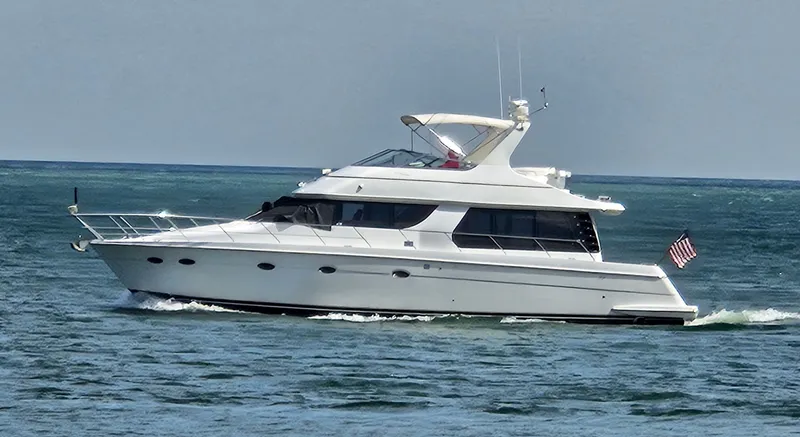 The Image of 1999 Carver 530 Voyager Pilothouse cruising on the sea. - 0