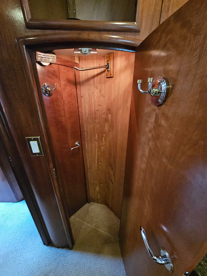 Slide: The Image of Interior of 1999 Carver 530 Voyager Pilothouse with wooden doors. - 27