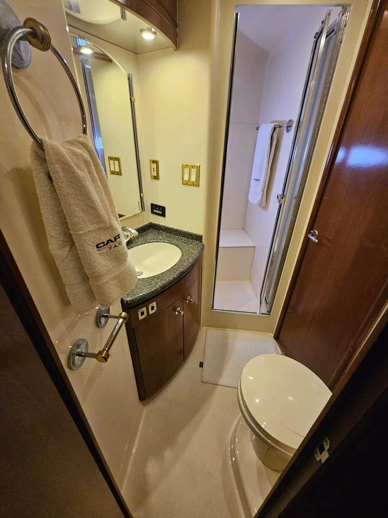 Slide: The Image of Interior view of a 1999 Carver 530 Voyager Pilothouse yacht bathroom. - 28