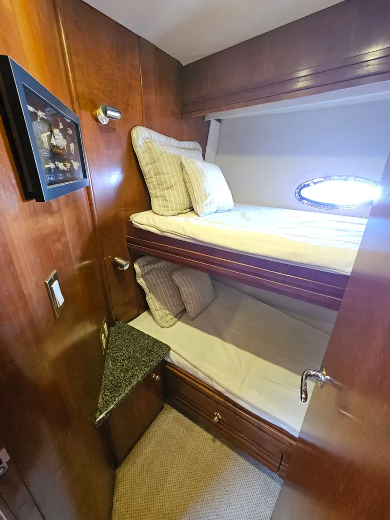 Slide: The Image of Interior of 1999 Carver 530 Voyager Pilothouse with bunk beds. - 30