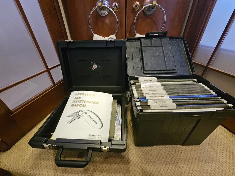 Slide: The Image of Carver 530 Voyager 1999 manual and files in a case. - 38
