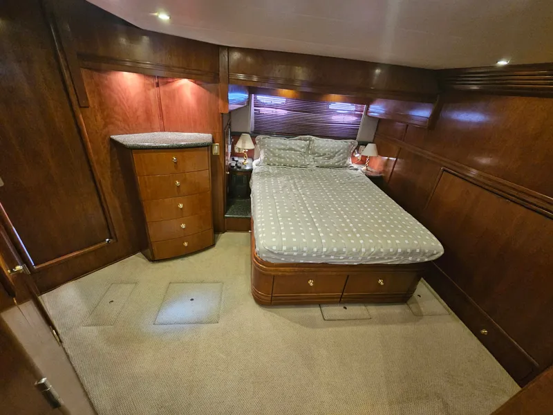 Slide: The Image of Luxurious cabin of 1999 Carver 530 Voyager Pilothouse with wooden furnishings. - 4