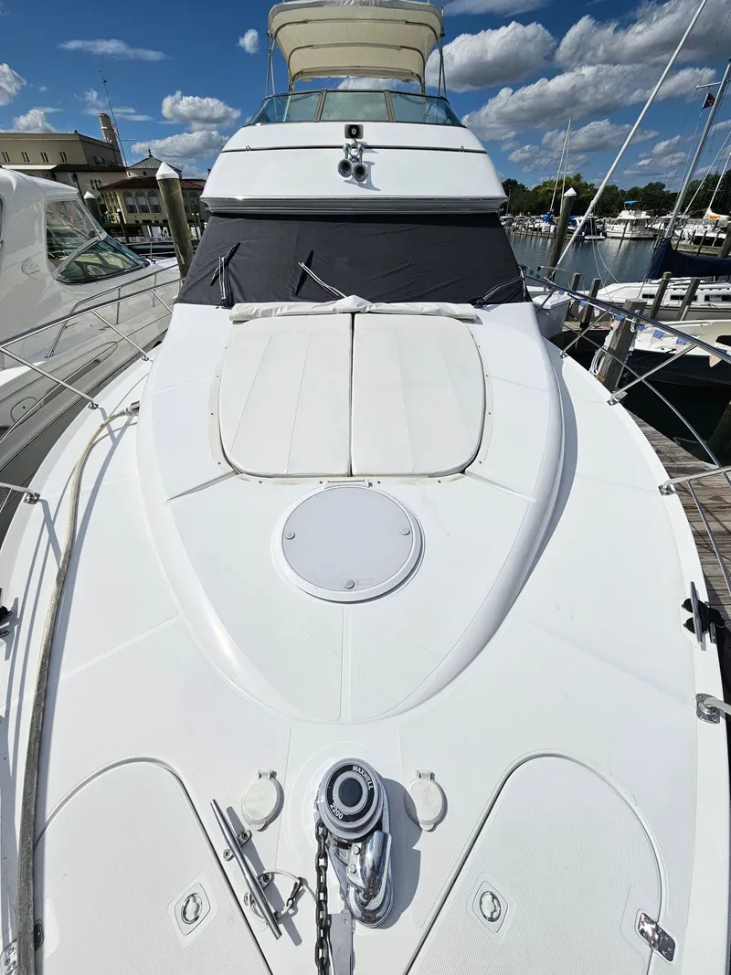 Slide: The Image of 1999 Carver 530 Voyager Pilothouse on a sunny dock. - 6