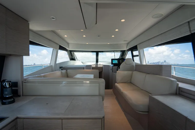 Slide: The Image of Luxurious interior of 2022 Ferretti Yachts 500 with modern seating and ocean view. - 24