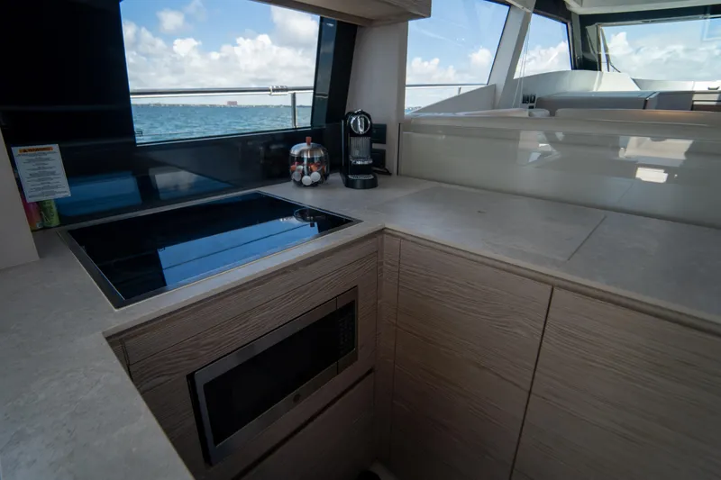 Slide: The Image of Modern kitchen interior of 2022 Ferretti Yachts 500 with ocean view. - 25