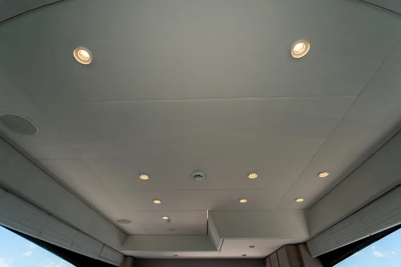 Slide: The Image of Ceiling of 2022 Ferretti Yachts 500 with recessed lighting and modern design. - 30