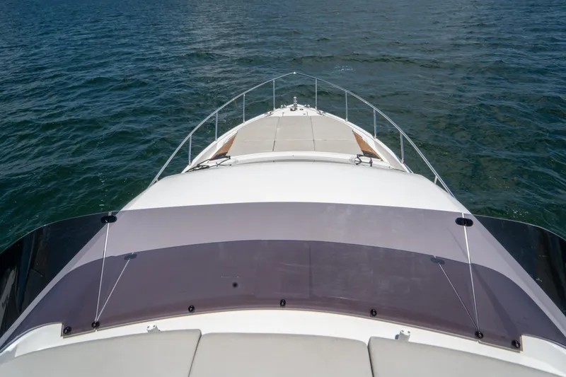 Slide: The Image of 2022 Ferretti Yachts 500 bow view on open water. - 44