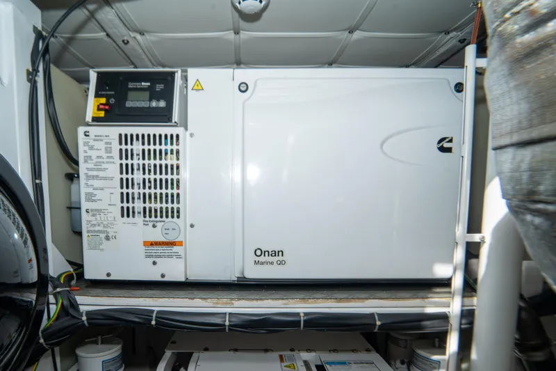 Slide: The Image of Onan Marine QD generator in 2022 Ferretti Yachts 500 engine room. - 54