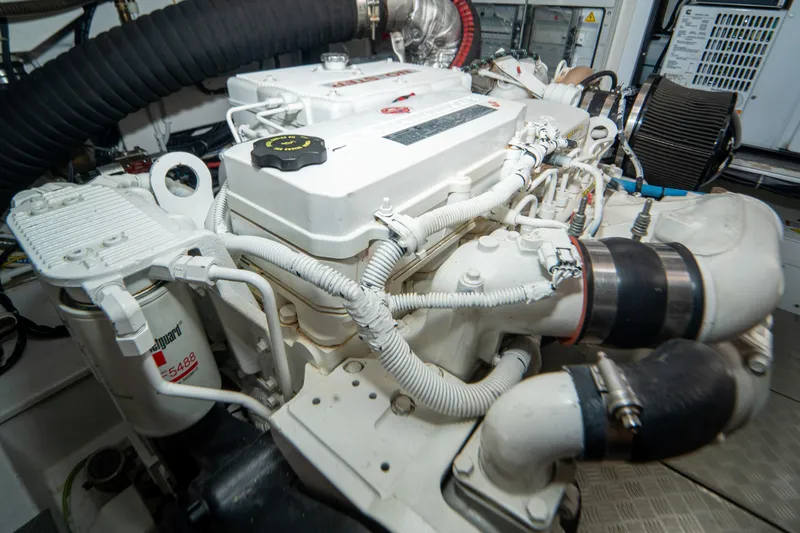 Slide: The Image of Engine room of 2022 Ferretti Yachts 500, showcasing detailed mechanical components. - 56