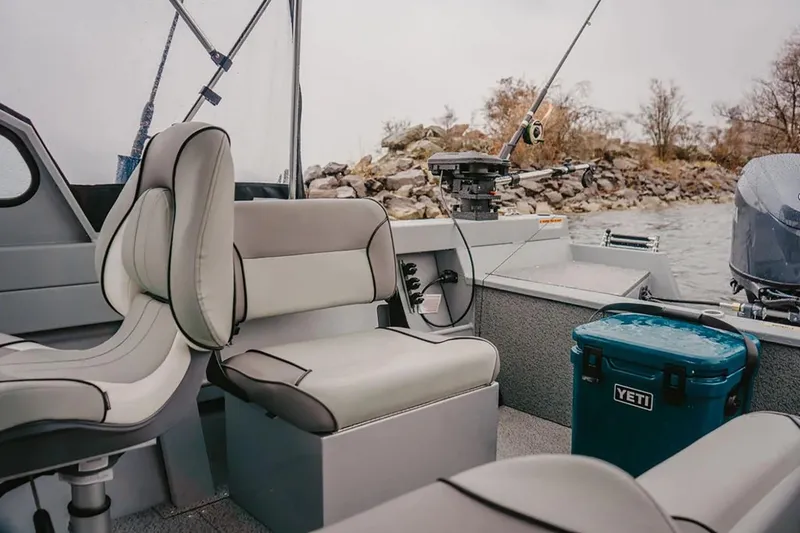 Slide: The Image of Manufacturer Provided Image: Interior of 2026 KingFisher 16 Falcon boat with seating and fishing gear. - 3