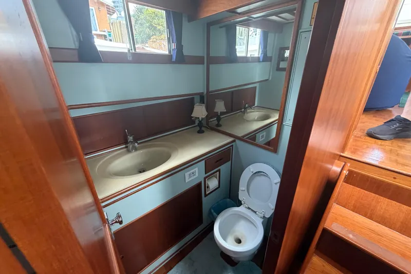 Slide: The Image of Bathroom interior of 1991 Grand Banks 46 Classic yacht with sink and toilet. - 23