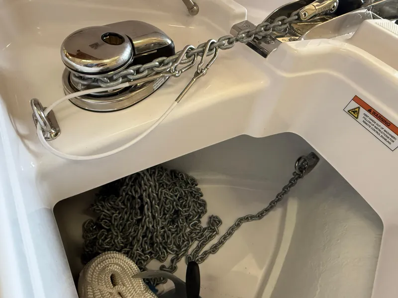 Slide: The Image of Anchor chain and winch system on 2025 Axopar 29 Sun Top boat. - 36