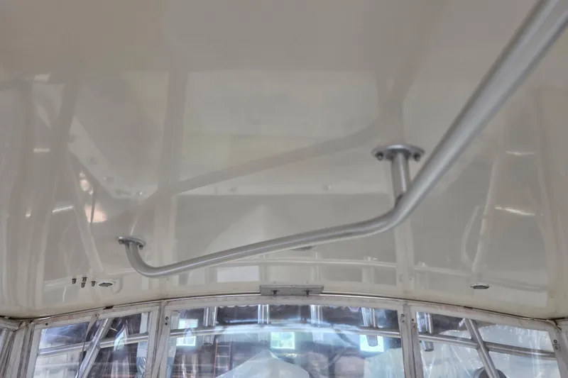 Slide: The Image of Interior view of 2004 Carolina Classic 35 boat with metal handrail. - 10