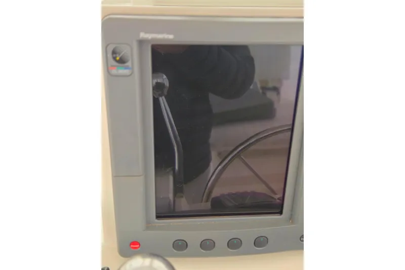Slide: The Image of Close-up of a Raymarine marine display on a 2004 Carolina Classic 35 boat. - 14