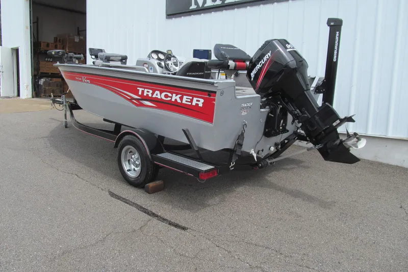 Slide: The Image of 2010 Tracker Pro Guide V-175 SC boat with Mercury engine on trailer. - 2