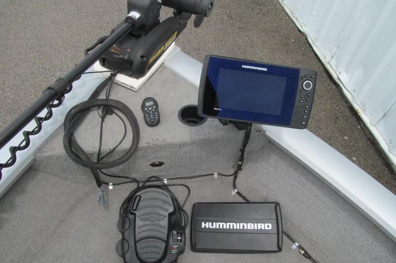 Slide: The Image of 2010 Tracker Pro Guide V-175 SC boat with Humminbird electronics and trolling motor setup. - 8