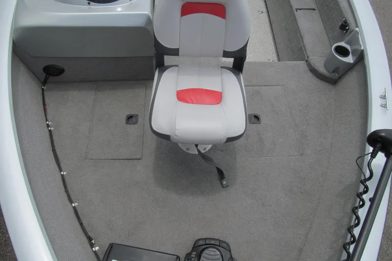 Slide: The Image of 2010 Tracker Pro Guide V-175 SC boat interior with seating and carpeted floor. - 9