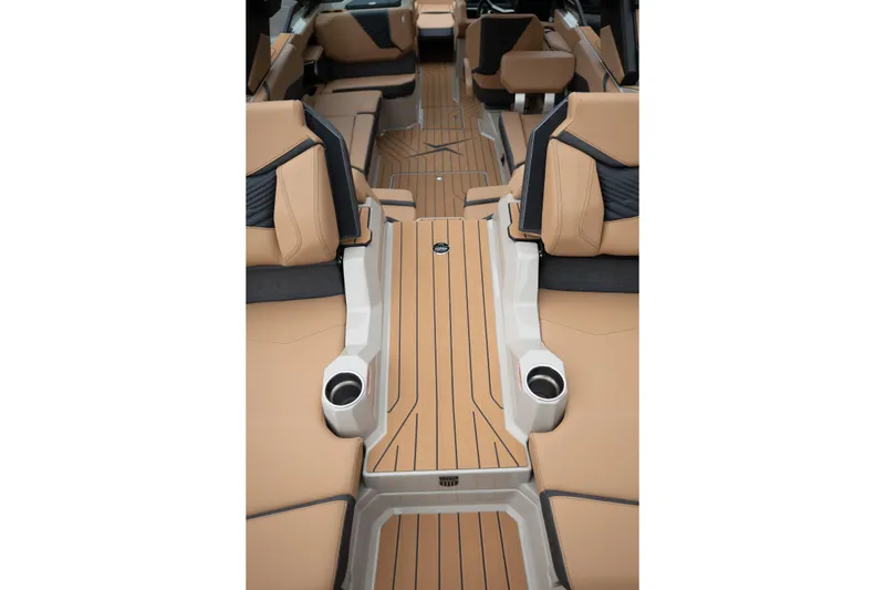 Slide: The Image of Luxurious interior of 2026 MasterCraft X24 boat with tan seating and sleek design. - 16