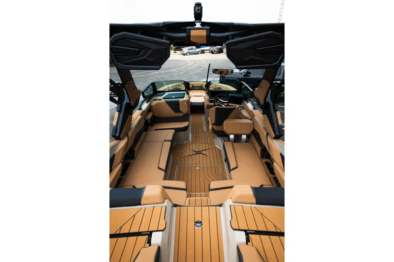 Slide: The Image of Luxurious interior of 2026 MasterCraft X24 boat with tan seating and sleek design. - 18