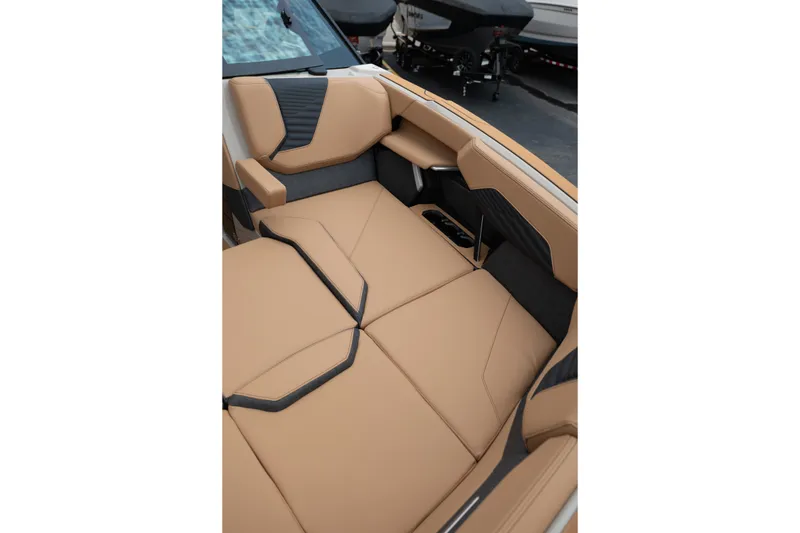 Slide: The Image of Luxurious tan seating in 2026 MasterCraft X24 boat interior. - 33