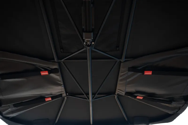 Slide: The Image of 2026 MasterCraft X24 boat canopy interior with sturdy frame and sleek design. - 39