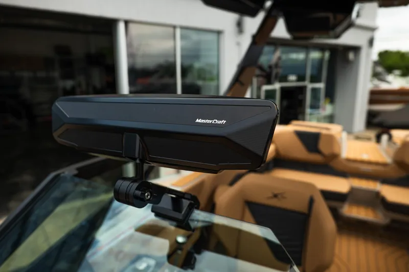 Slide: The Image of 2026 MasterCraft X24 boat interior with advanced rearview mirror. - 42