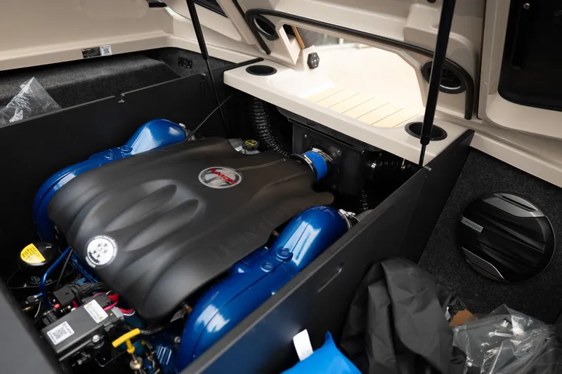 Slide: The Image of 2026 MasterCraft X24 engine compartment showcasing powerful inboard motor design. - 43