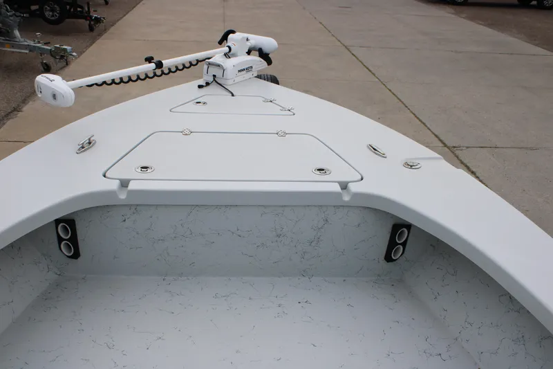 Slide: The Image of 2021 Blazer Bay 2220 GTS boat with trolling motor on concrete surface. - 8