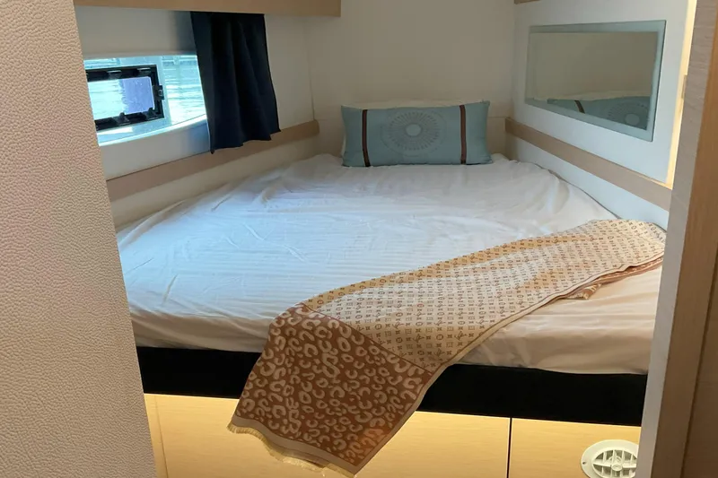 Slide: The Image of Cozy bedroom in 2017 Fountaine Pajot Lucia 40 catamaran with window view. - 11