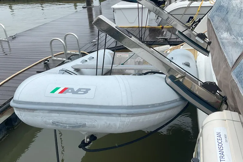 Slide: The Image of Inflatable dinghy on a 2017 Fountaine Pajot Lucia 40 catamaran at dock. - 17