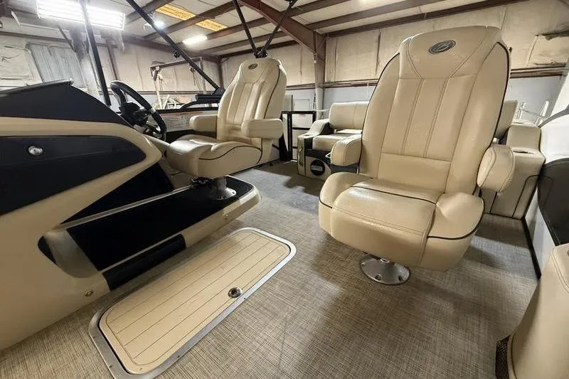 Slide: The Image of Interior of 2020 Barletta L23UC boat with beige leather seating and modern design. - 11
