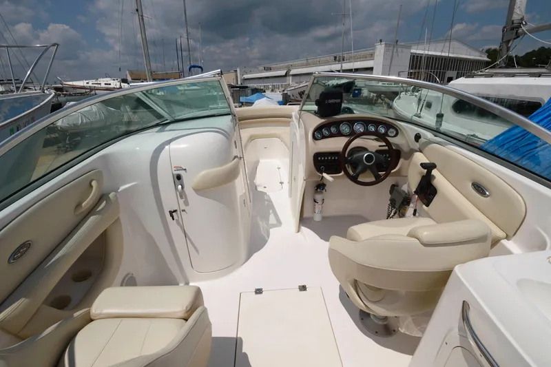 Slide: The Image of Interior of a 2004 Chaparral 260 SSi boat with helm station. - 3
