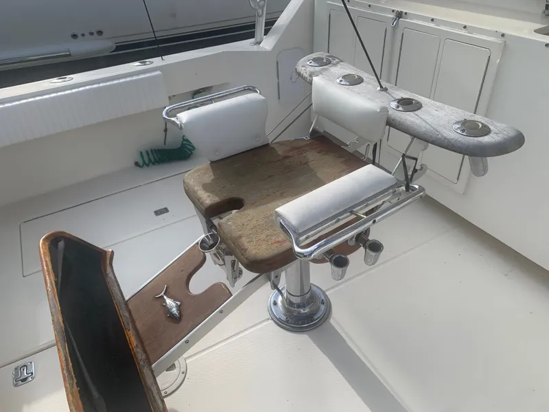 Slide: The Image of Fishing chair on a 2003 Carolina Classic Express boat. - 10