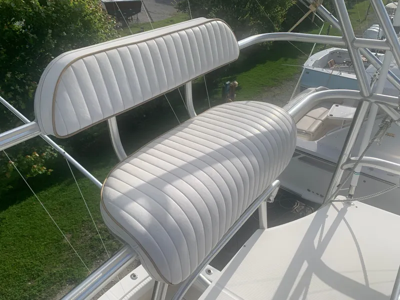 Slide: The Image of Cushioned bench on Carolina Classic Express 2003 boat. - 14